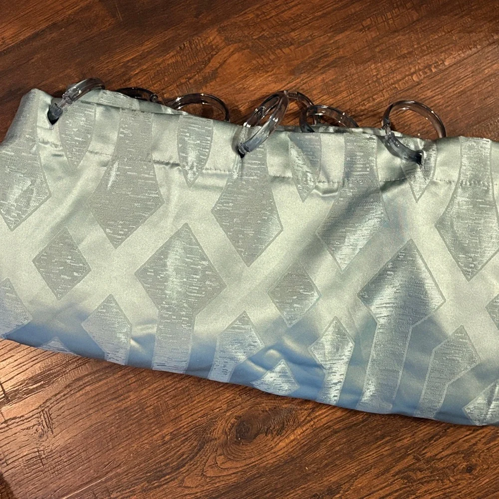 Teal shower curtain with hooks